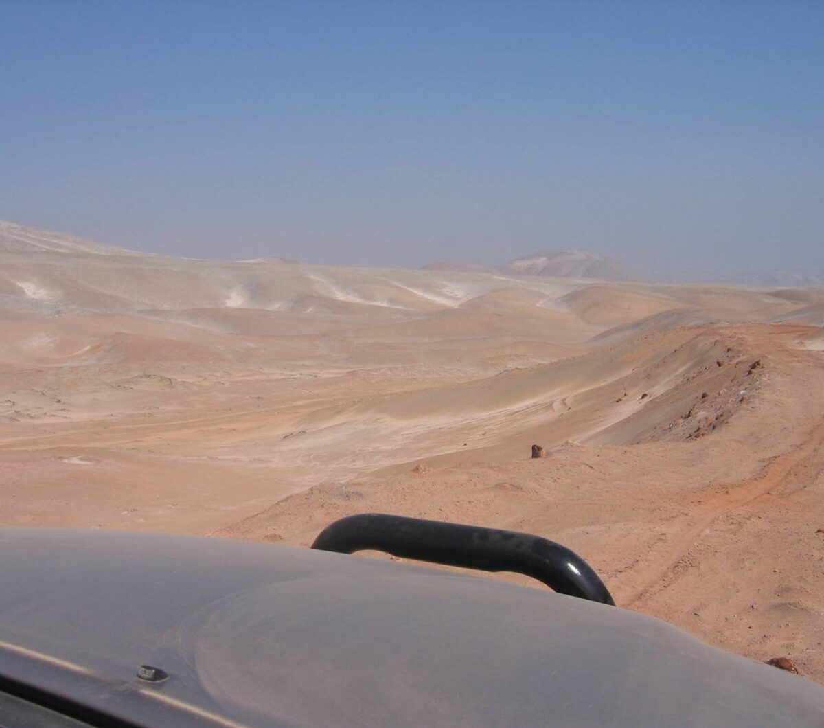 Approaching An Alteration Zone At The Arikepay Project, Noticing The Change Of Color Of The Rock And Sand.