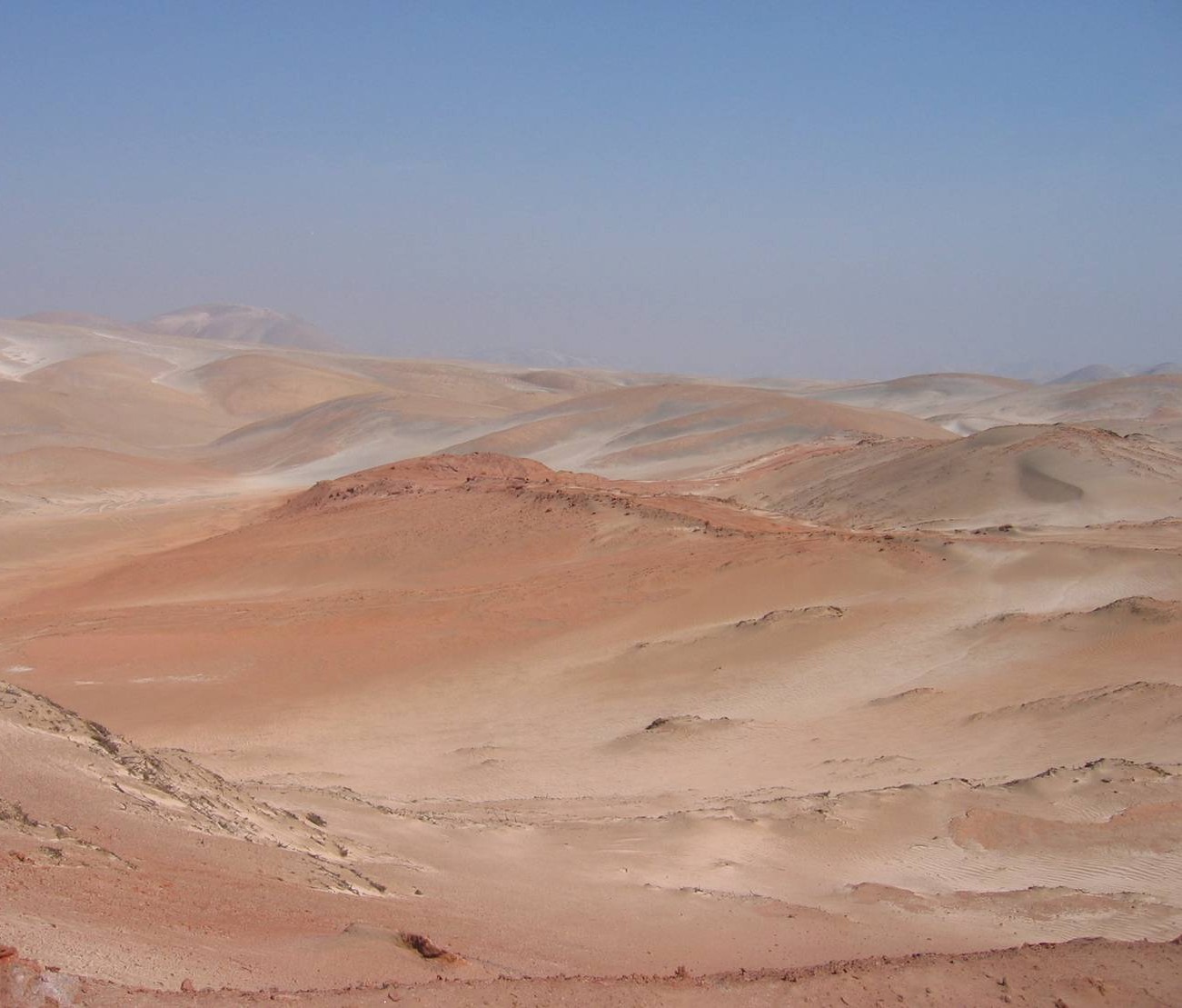 Approaching An Alteration Zone At The Arikepay Project, Noticing The Change Of Color Of The Rock And Sand. (2)