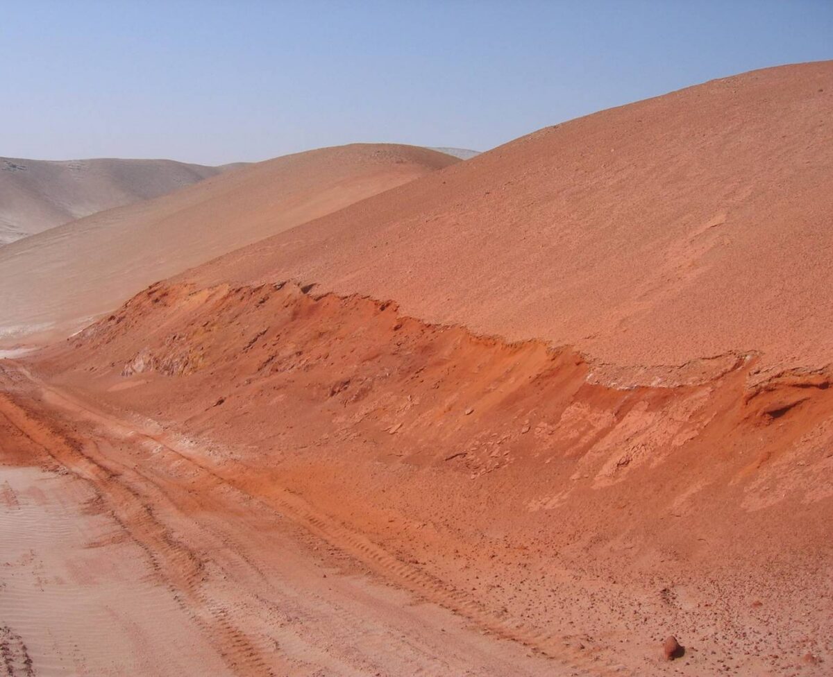 Approaching An Alteration Zone At The Arikepay Project, Noticing The Change Of Color Of The Rock And Sand. (3)